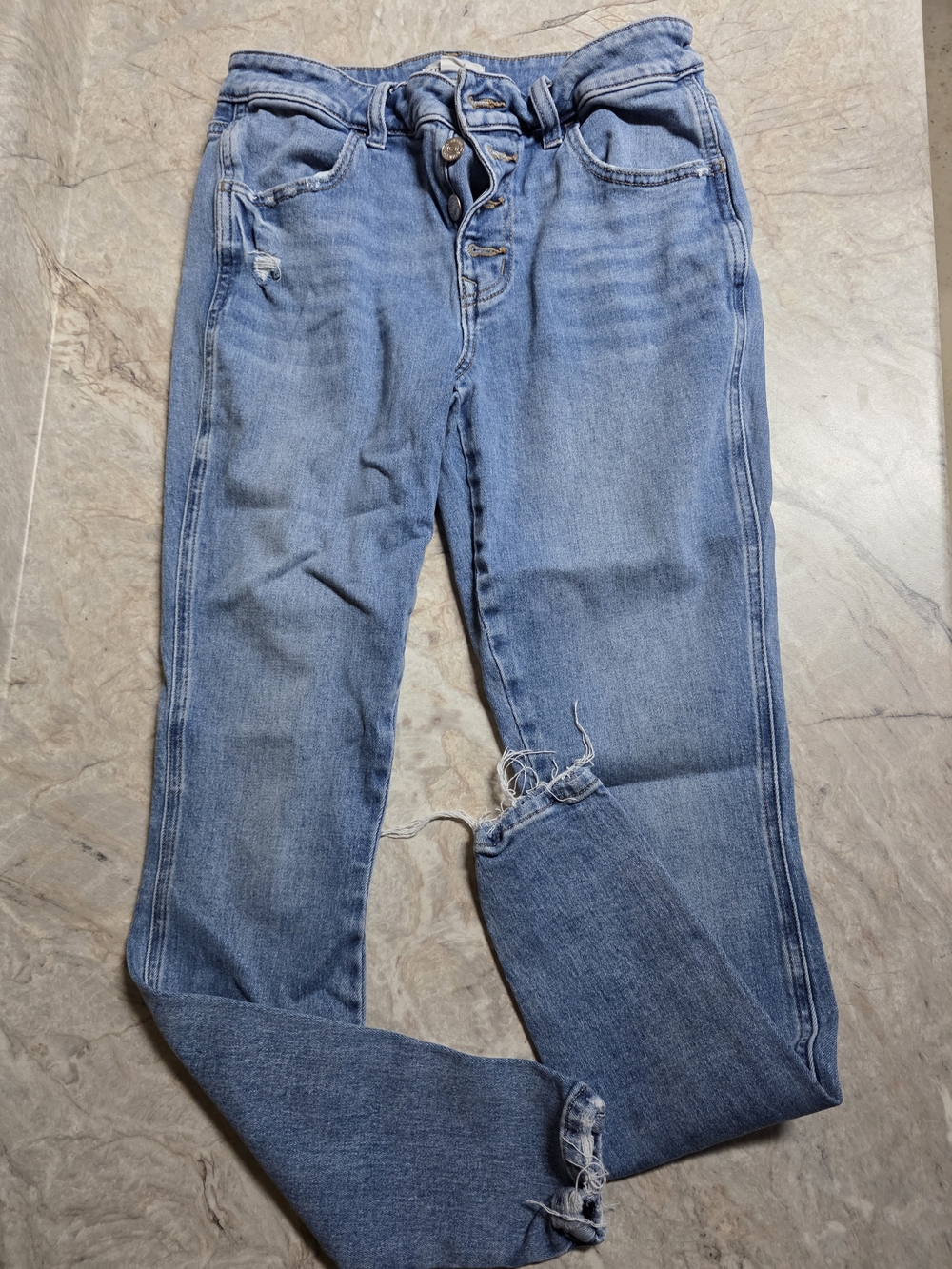 Women's Light Blue Distressed Jeans
